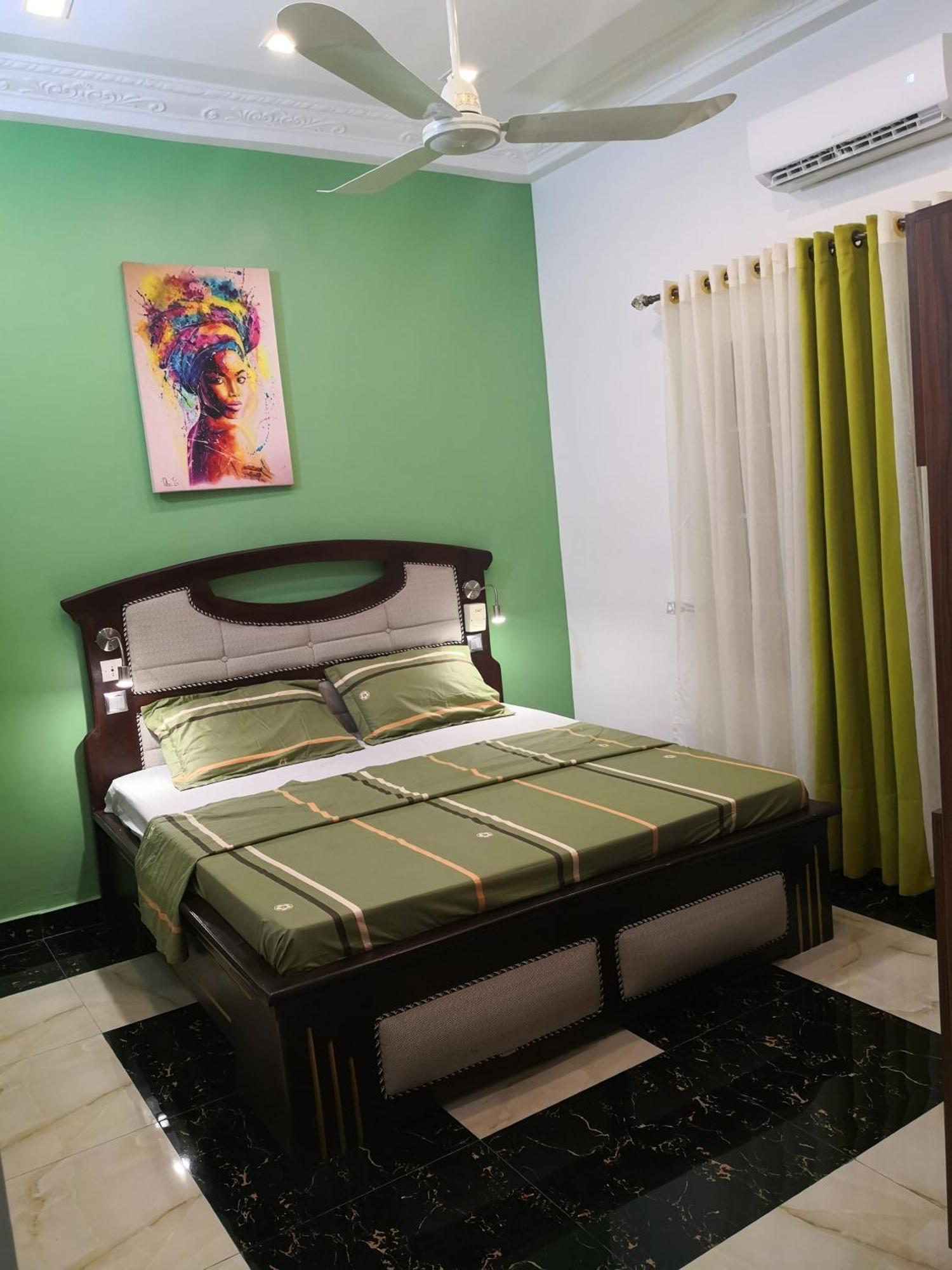 Residence Palais Du Stade Cotonou Rom bilde