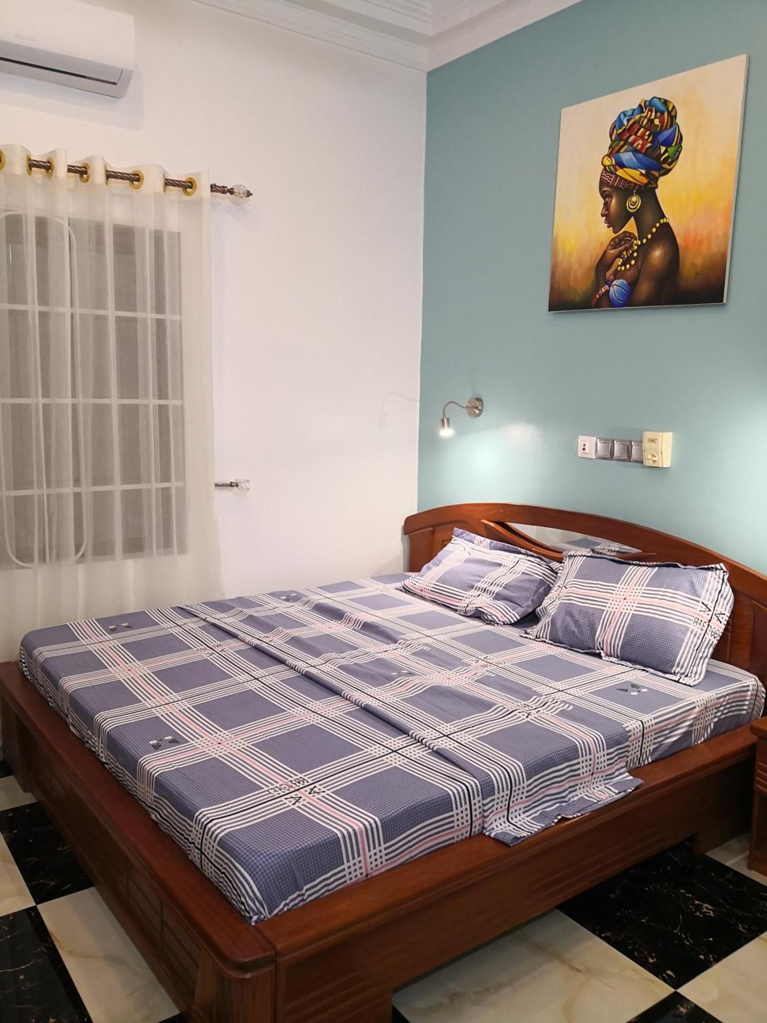 Residence Palais Du Stade Cotonou Rom bilde